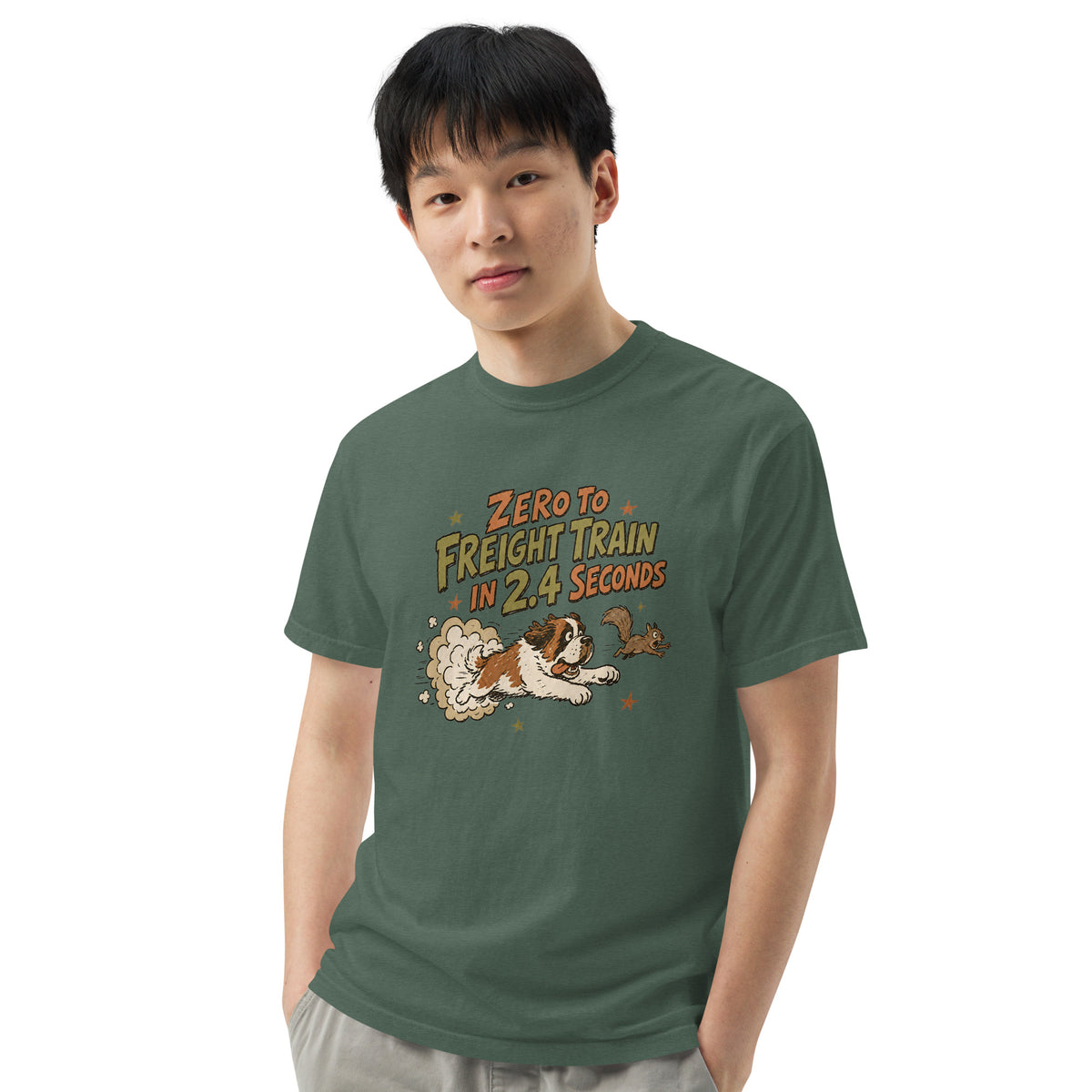 Blue spruce Comfort Colors t-shirt with a retro earth tone cartoon of a funny Saint Bernard chasing a squirrel and Zero to Freight Train in 2.4 Seconds lettering.