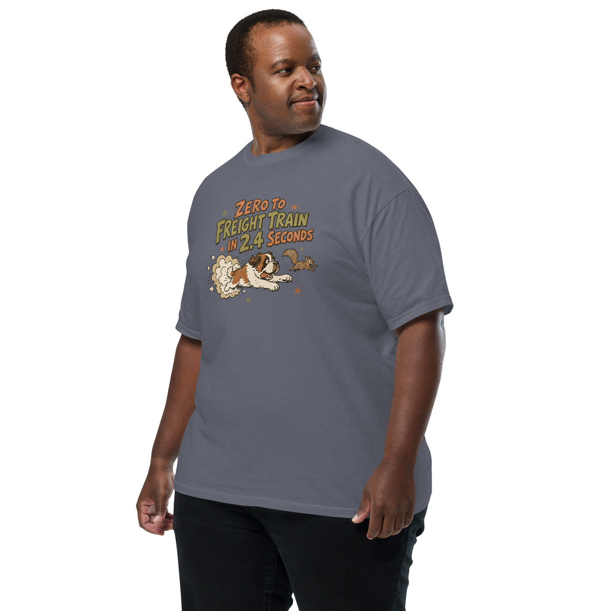 Denim blue Comfort Colors t-shirt with a retro earth tone cartoon of a funny Saint Bernard chasing a squirrel and Zero to Freight Train in 2.4 Seconds lettering.