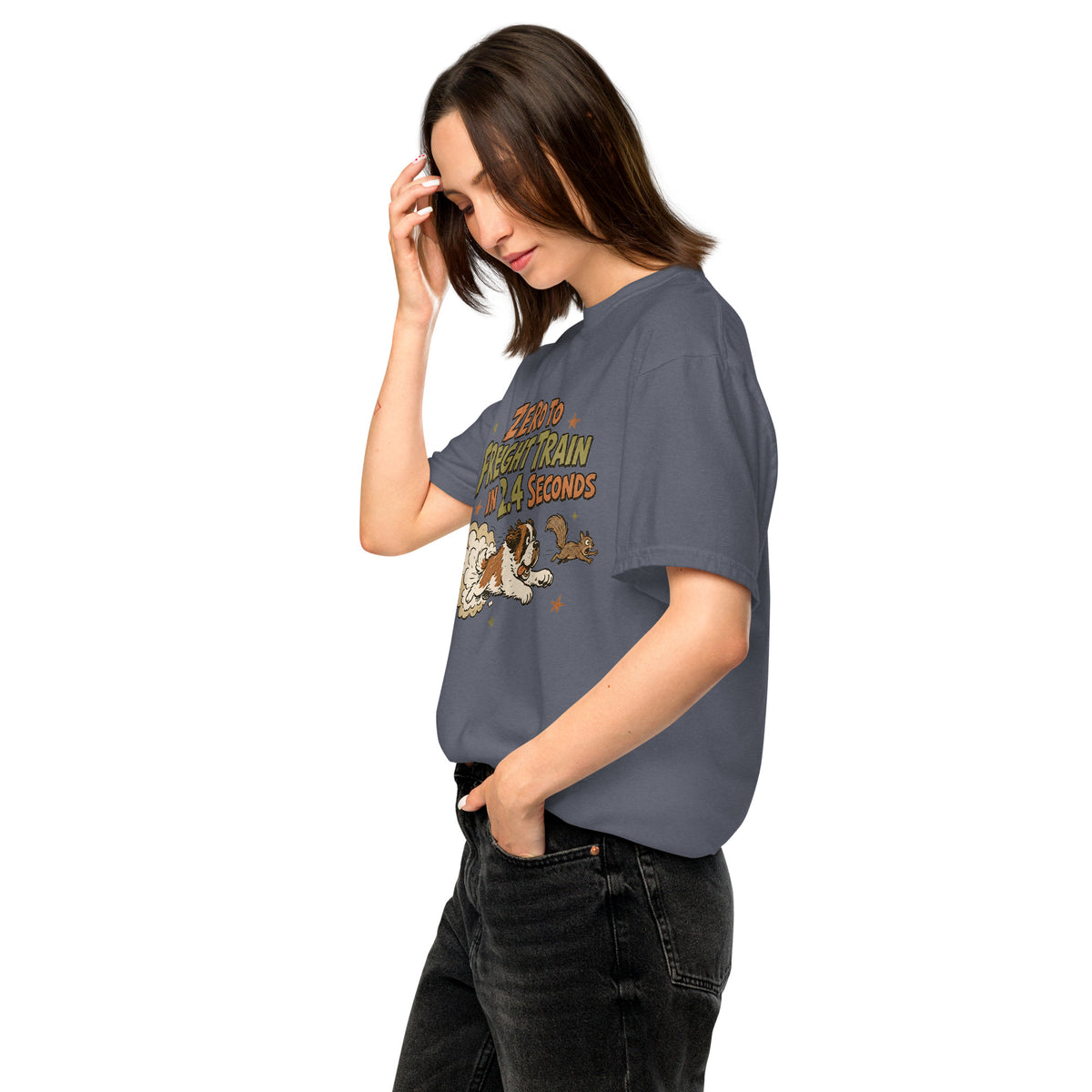 Denim blue Comfort Colors t-shirt with a retro earth tone cartoon of a funny Saint Bernard chasing a squirrel and Zero to Freight Train in 2.4 Seconds lettering.