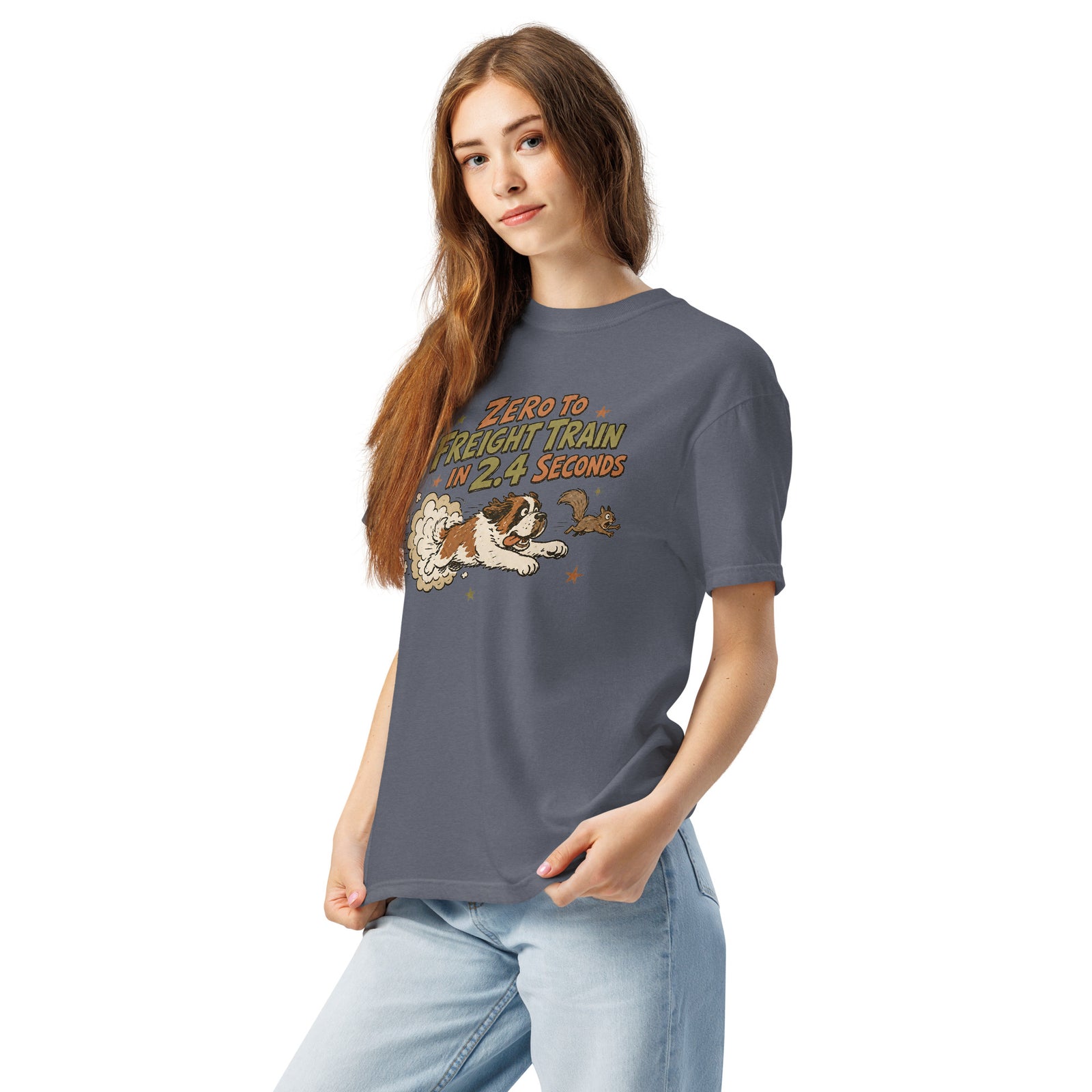 Denim blue Comfort Colors t-shirt with a retro earth tone cartoon of a funny Saint Bernard chasing a squirrel and Zero to Freight Train in 2.4 Seconds lettering.