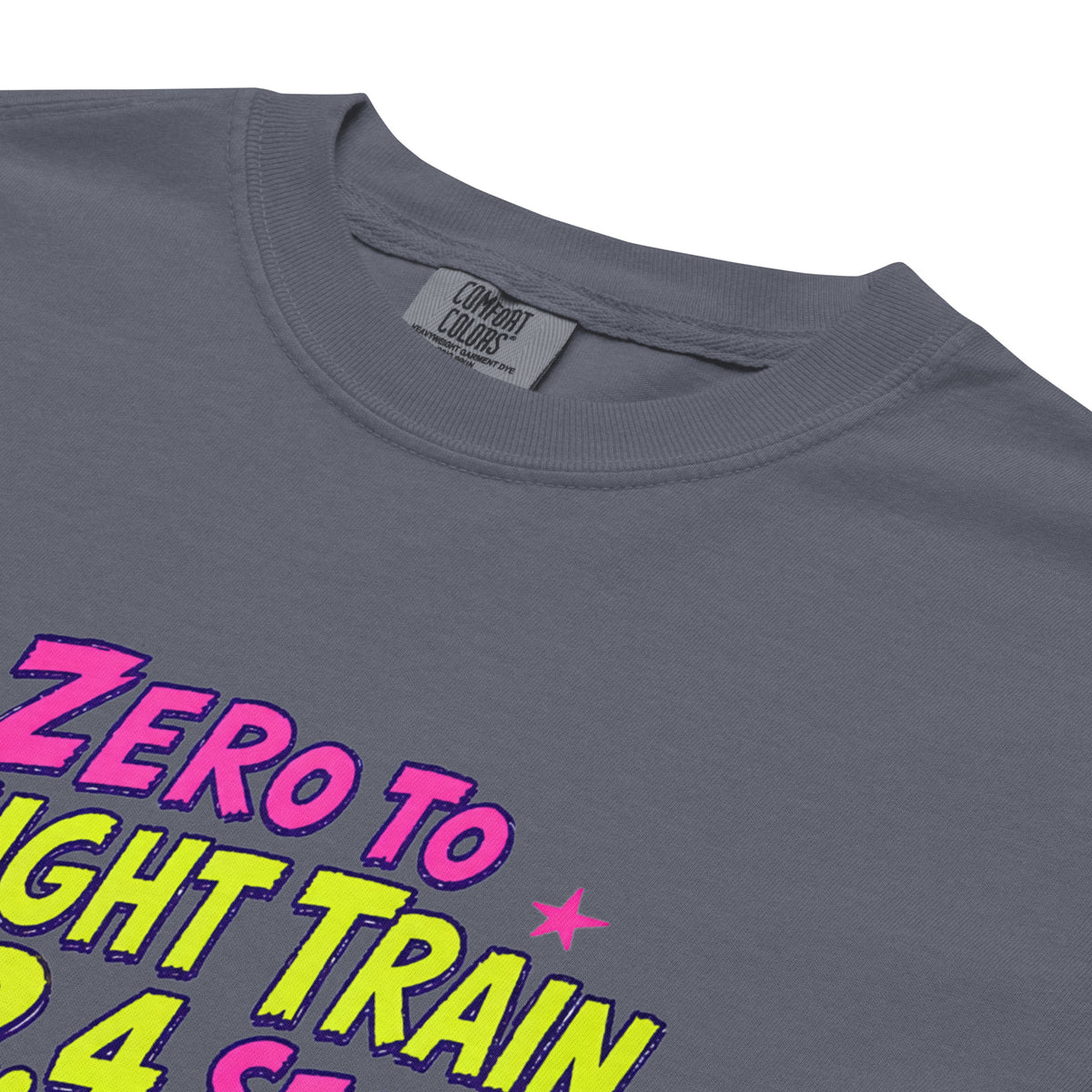 Denim Comfort Colors t-shirt with a bright retro cartoon Saint Bernard chasing a squirrel and Zero to Freight Train in 2.4 Seconds lettering.