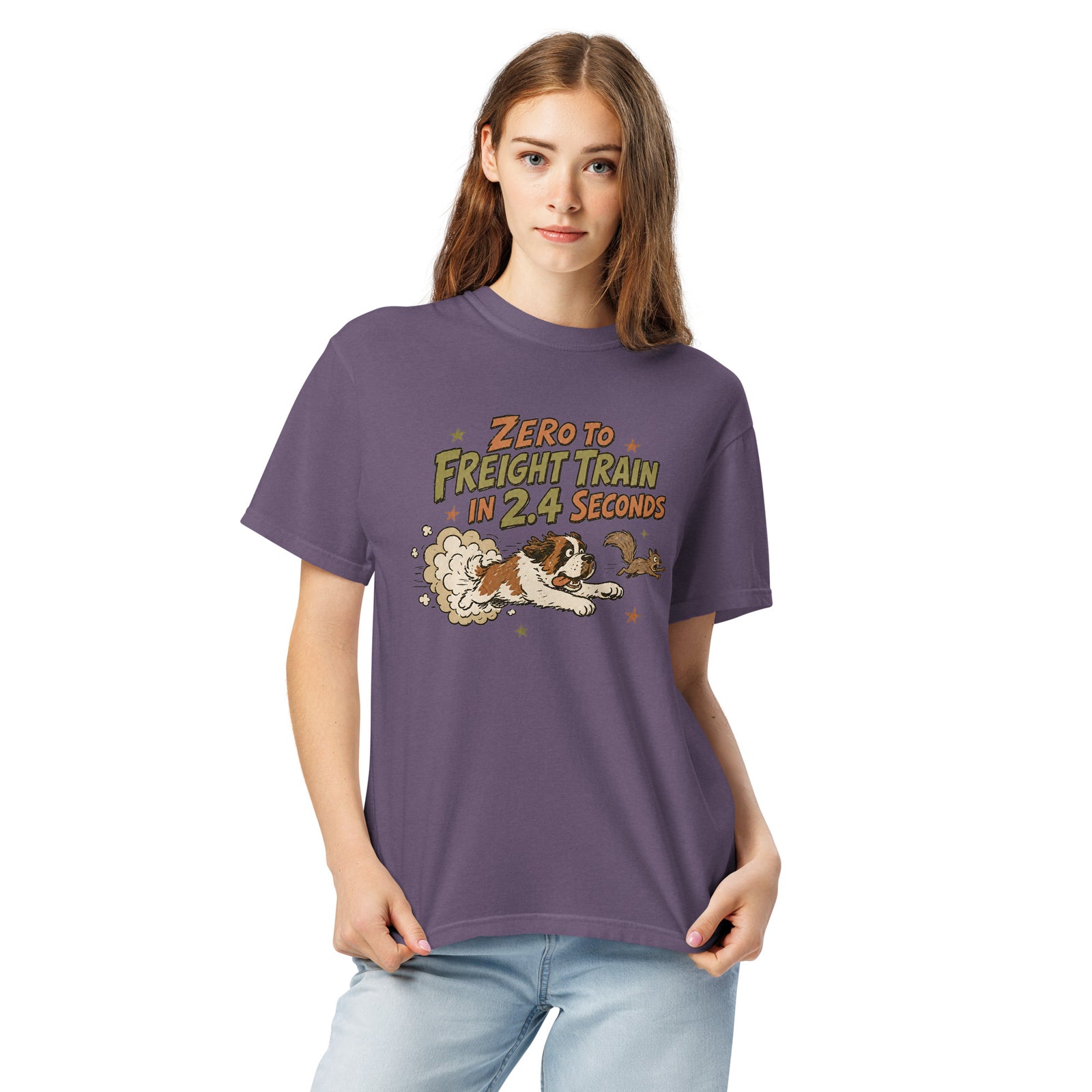 Grape purple Comfort Colors t-shirt with a retro earth tone cartoon of a funny Saint Bernard chasing a squirrel and Zero to Freight Train in 2.4 Seconds lettering.