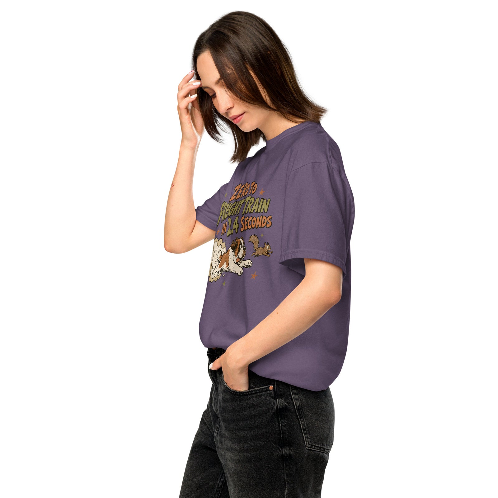 Grape purple Comfort Colors t-shirt with a retro earth tone cartoon of a funny Saint Bernard chasing a squirrel and Zero to Freight Train in 2.4 Seconds lettering.
