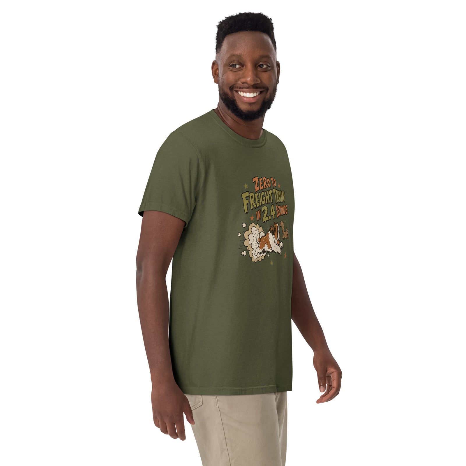 Hemp green Comfort Colors t-shirt with a retro earth tone cartoon of a funny Saint Bernard chasing a squirrel and Zero to Freight Train in 2.4 Seconds lettering.