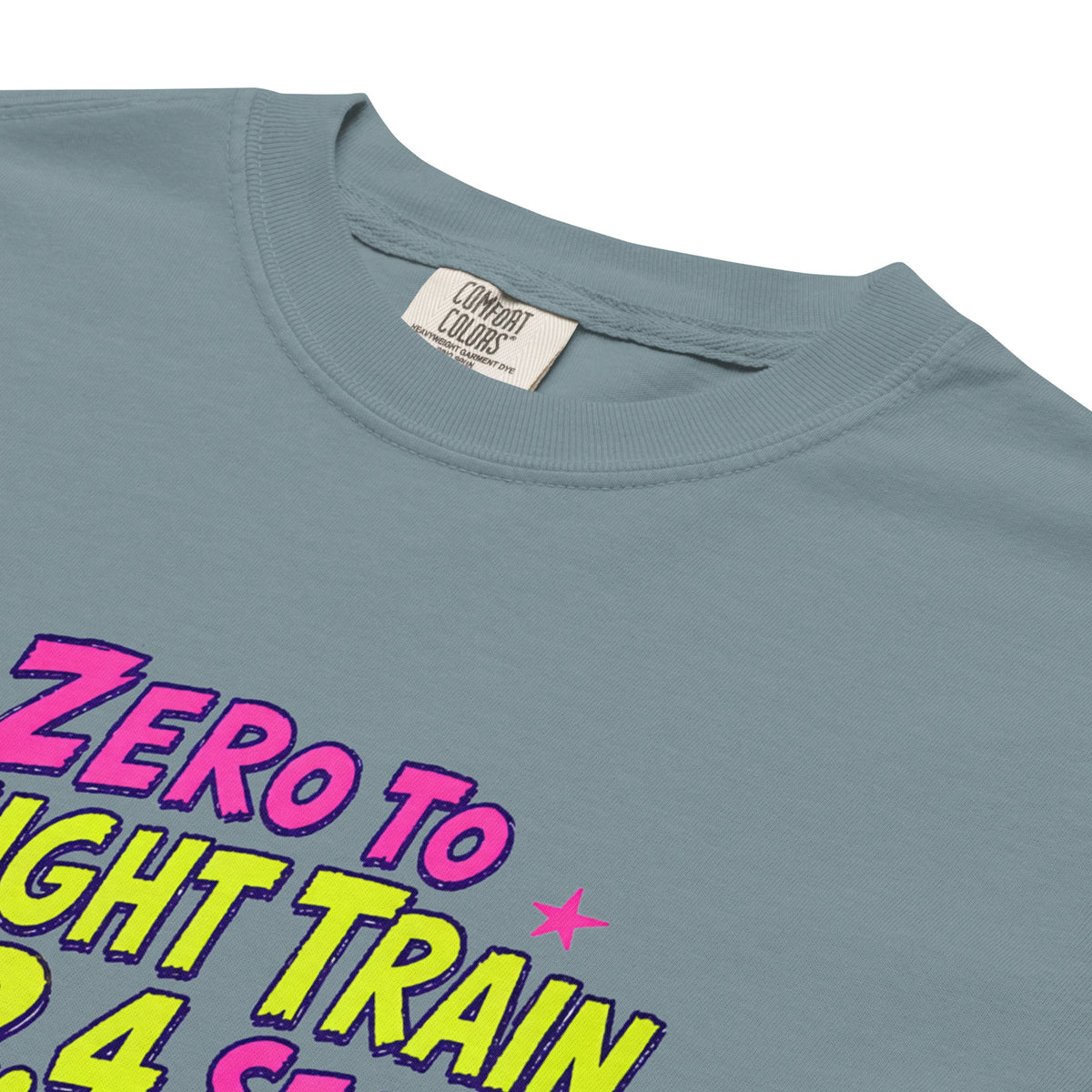 Ice Blue Comfort Colors t-shirt with a bright retro cartoon Saint Bernard chasing a squirrel and Zero to Freight Train in 2.4 Seconds lettering.