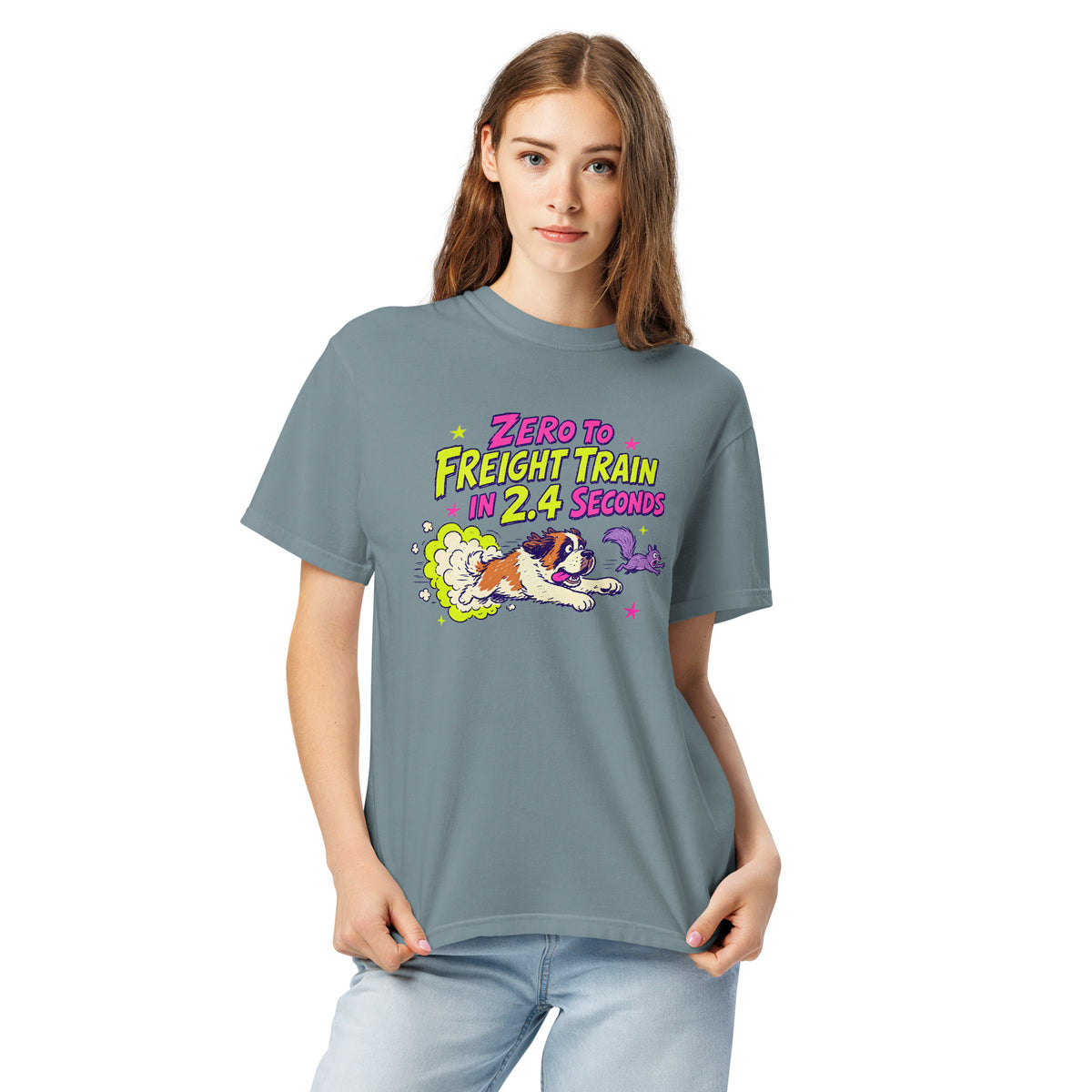 Ice Blue Comfort Colors t-shirt with a bright retro cartoon Saint Bernard chasing a squirrel and Zero to Freight Train in 2.4 Seconds lettering.