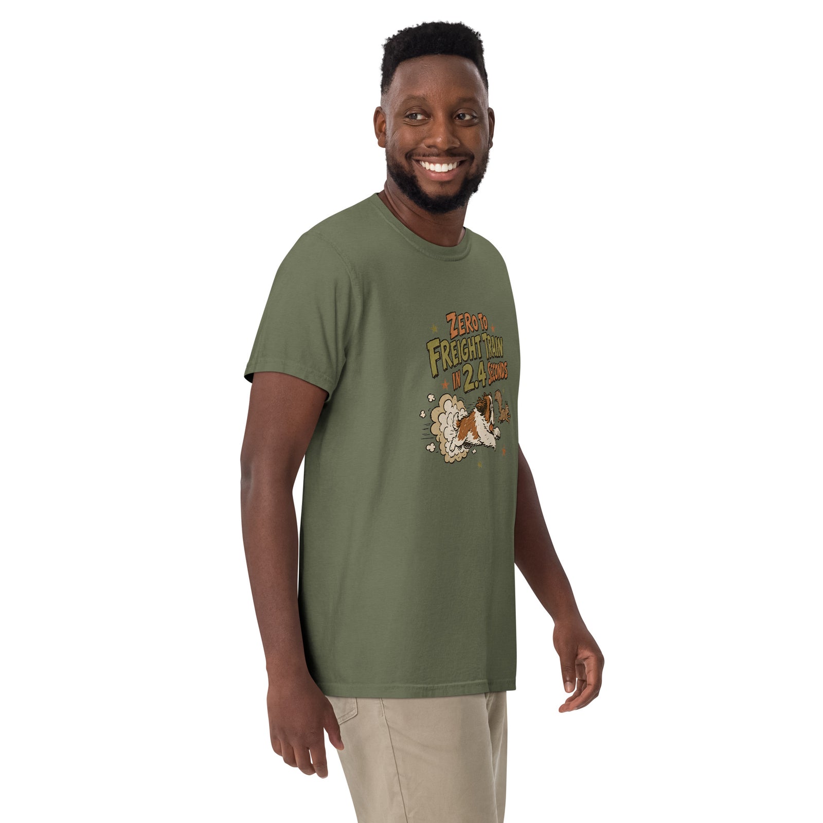 Moss green Comfort Colors t-shirt with a retro earth tone cartoon of a funny Saint Bernard chasing a squirrel and Zero to Freight Train in 2.4 Seconds lettering.