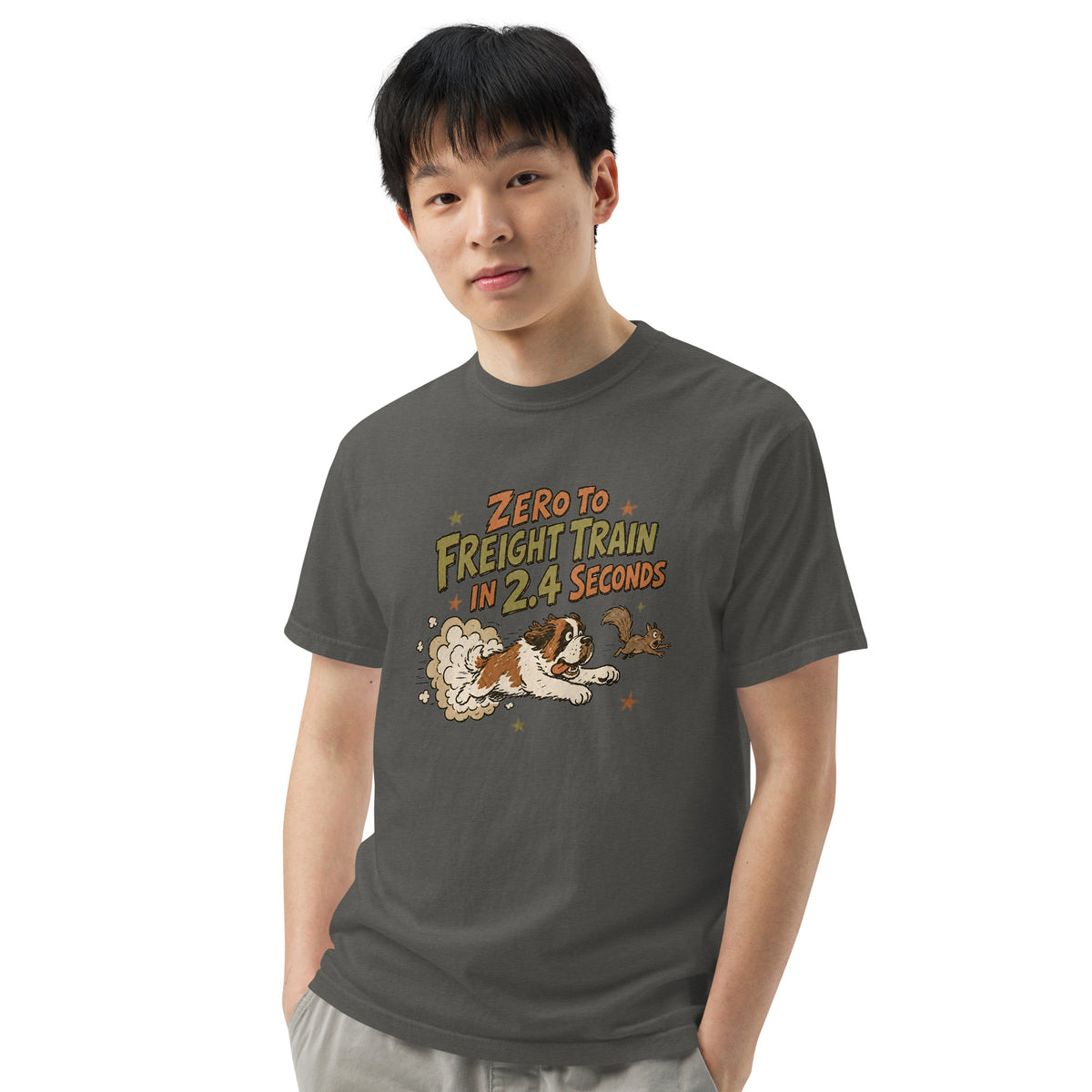 Pepper Comfort Colors t-shirt with a retro earth tone cartoon of a funny Saint Bernard chasing a squirrel and Zero to Freight Train in 2.4 Seconds lettering.