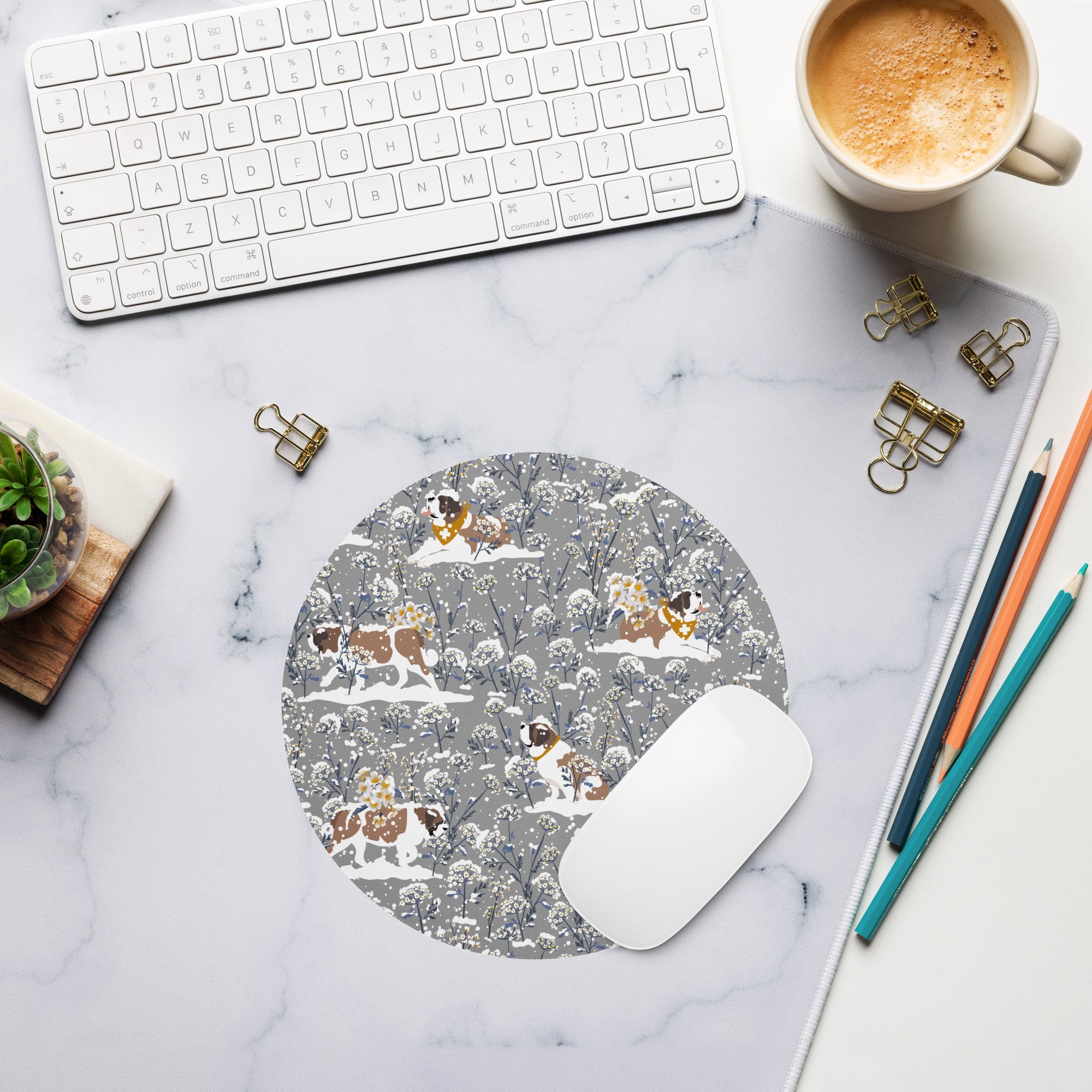 Round mouse pad with Saint Bernard winter floral pattern — snowy white and blue flowers, grey background, Saint Bernards with yellow bandanas making a perfect gift.