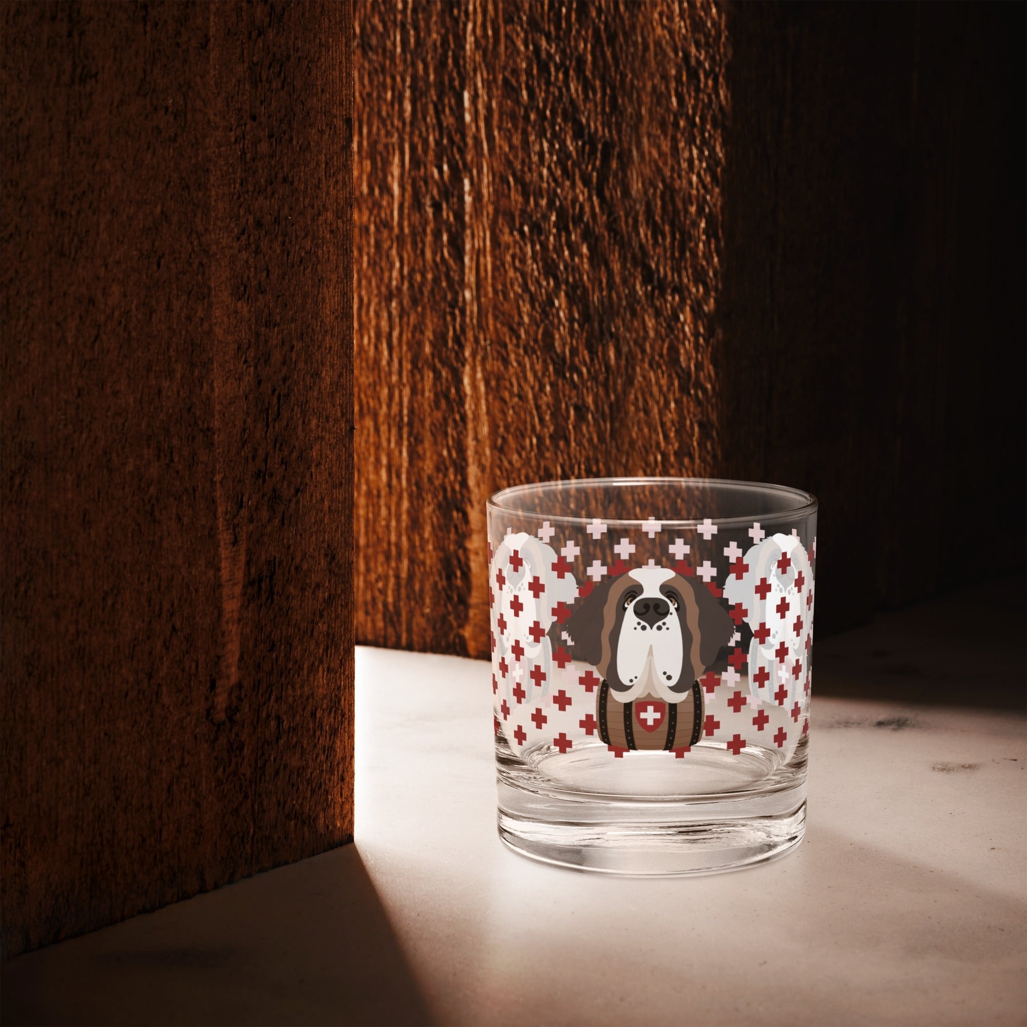 10.5 once rock glass drinkware with a modern pattern of Swiss inspired red crosses and a cute large Saint Bernard dog head with a barrel by Lucy and Norman