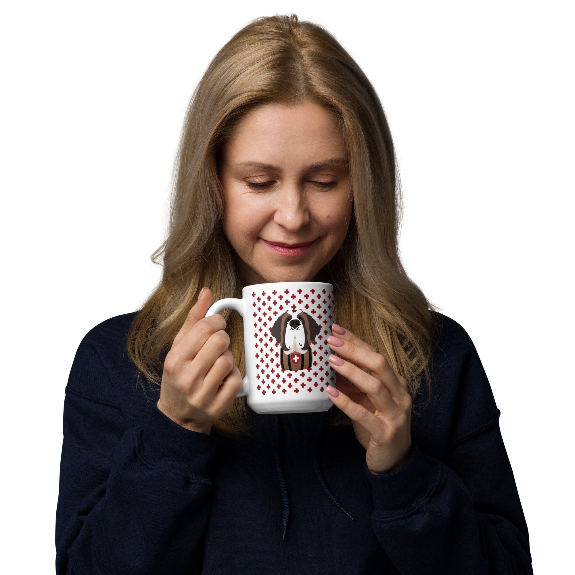 White ceramic 15 ounce mug featuring a cute illustrated Saint Bernard dog wearing a rescue barrel, surrounded by a red Swiss cross pattern. Perfect gift for St Bernard dog lovers and Swiss Alps fans by Lucy and Norman.