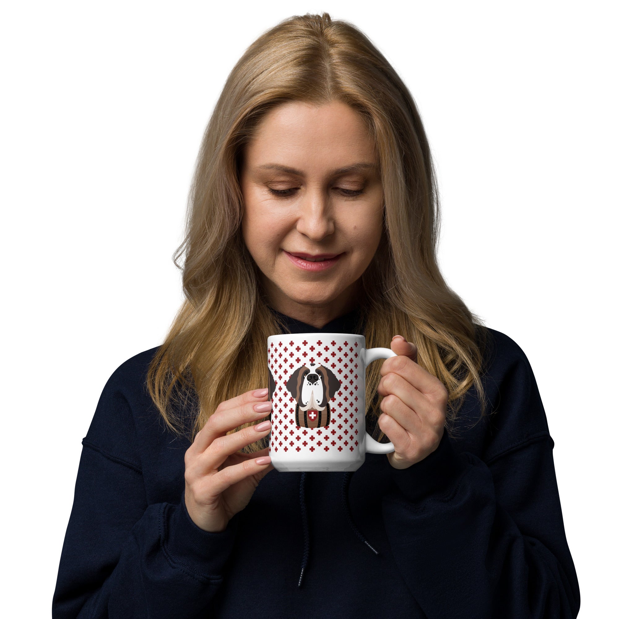 White ceramic 15 ounce mug featuring a cute illustrated Saint Bernard dog wearing a rescue barrel, surrounded by a red Swiss cross pattern. Perfect gift for St Bernard dog lovers and Swiss Alps fans by Lucy and Norman.