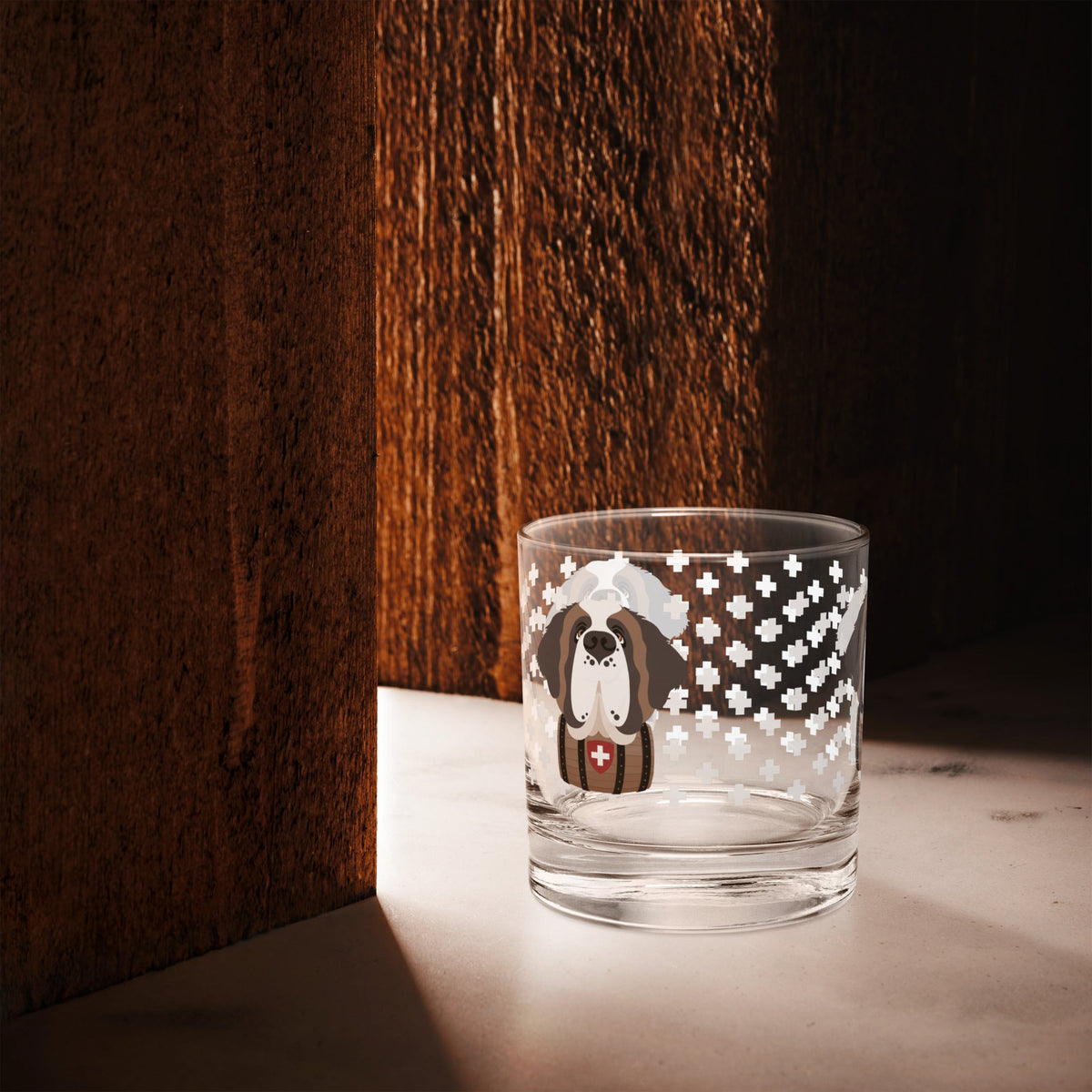 10.5 once rock glass drinkware with a modern pattern of Swiss inspired white crosses and a cute large Saint Bernard dog head with a barrel by Lucy and Norman