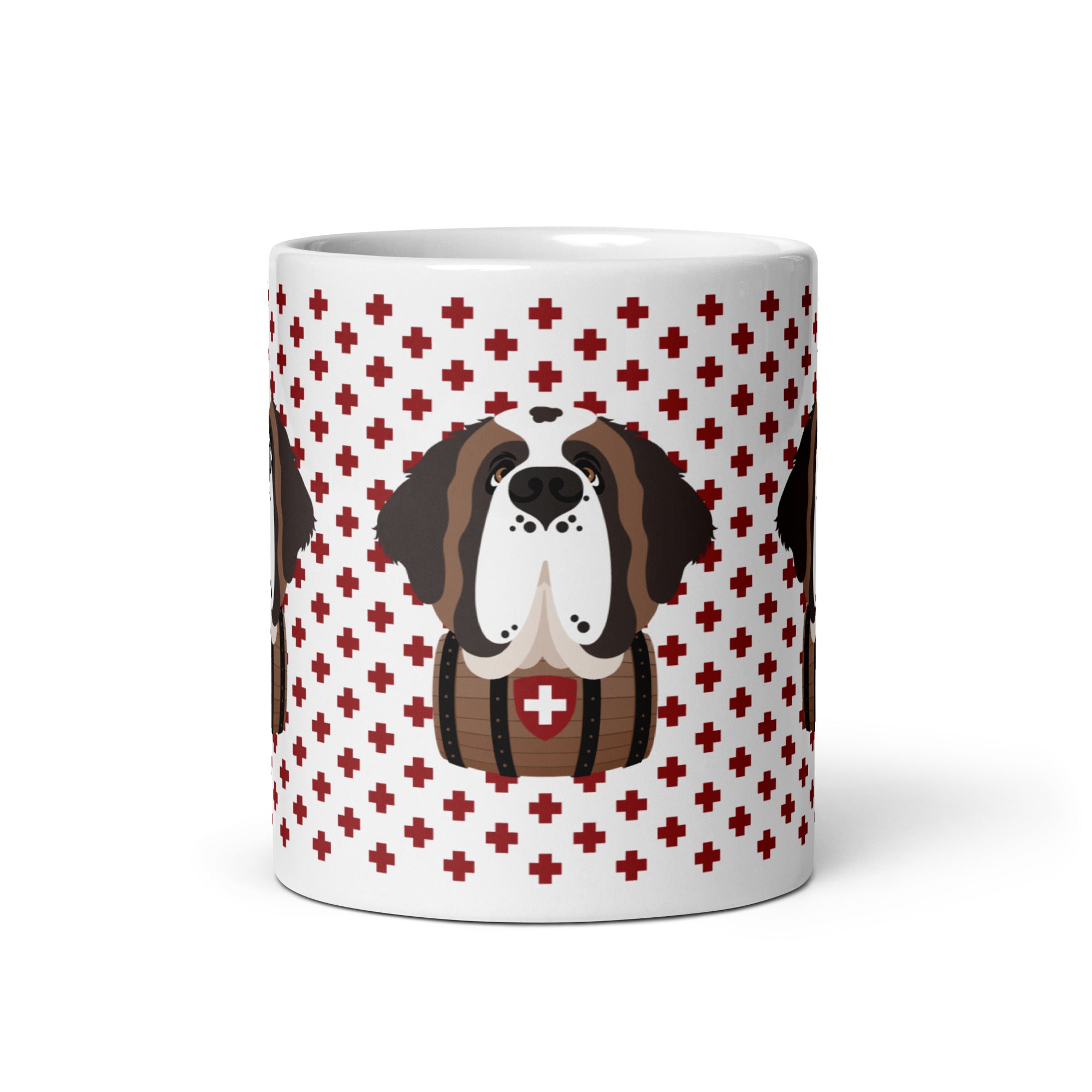 White ceramic 11 ounce mug featuring a cute illustrated Saint Bernard dog wearing a rescue barrel, surrounded by a red Swiss cross pattern. Perfect gift for St Bernard dog lovers and Swiss Alps fans by Lucy and Norman.