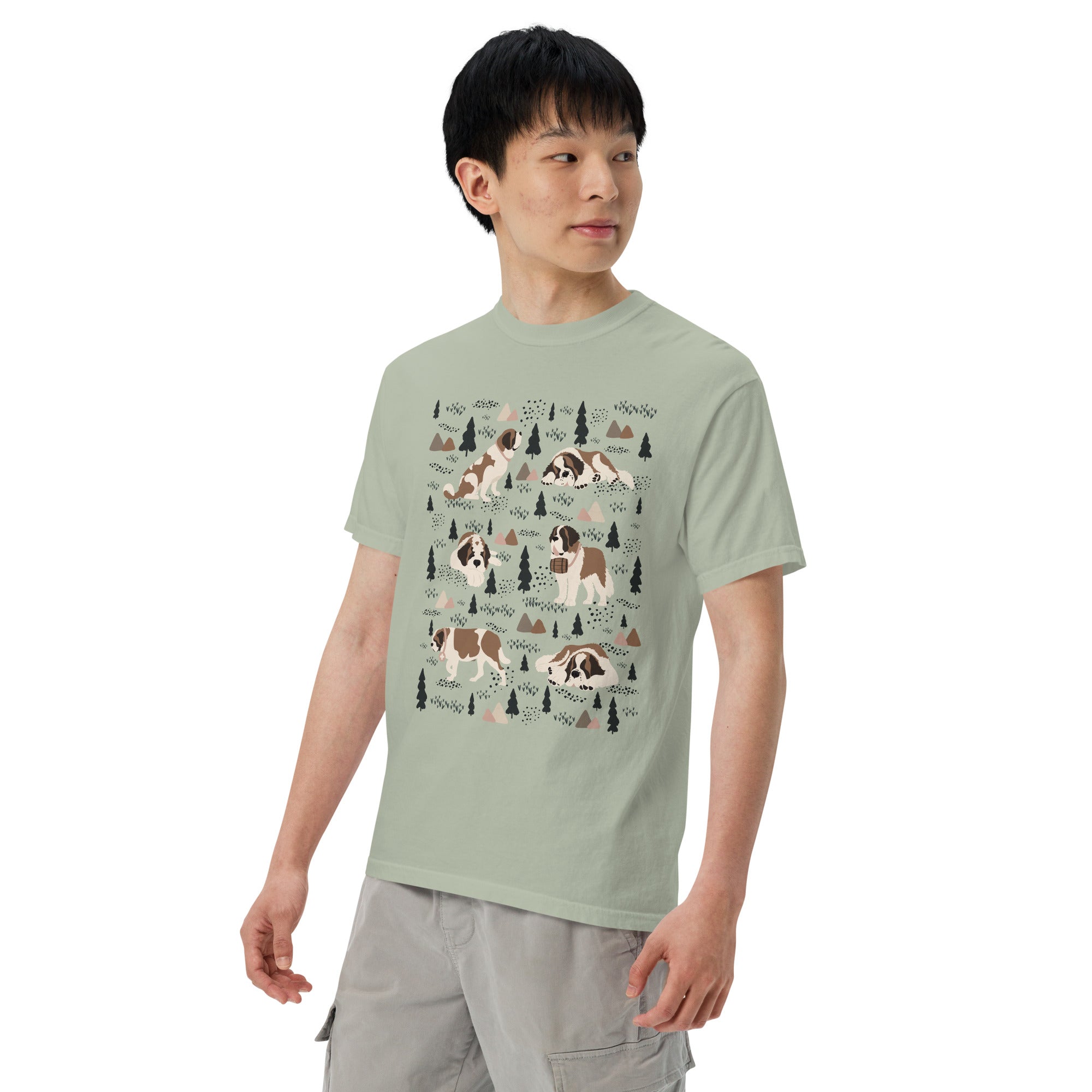 Comfort Colors bay green t-shirt featuring a woodland-themed Saint Bernard dog woodland and mountains pattern with six adorable Saint Bernards in various poses, perfect Saint Bernard gift for dog lovers.