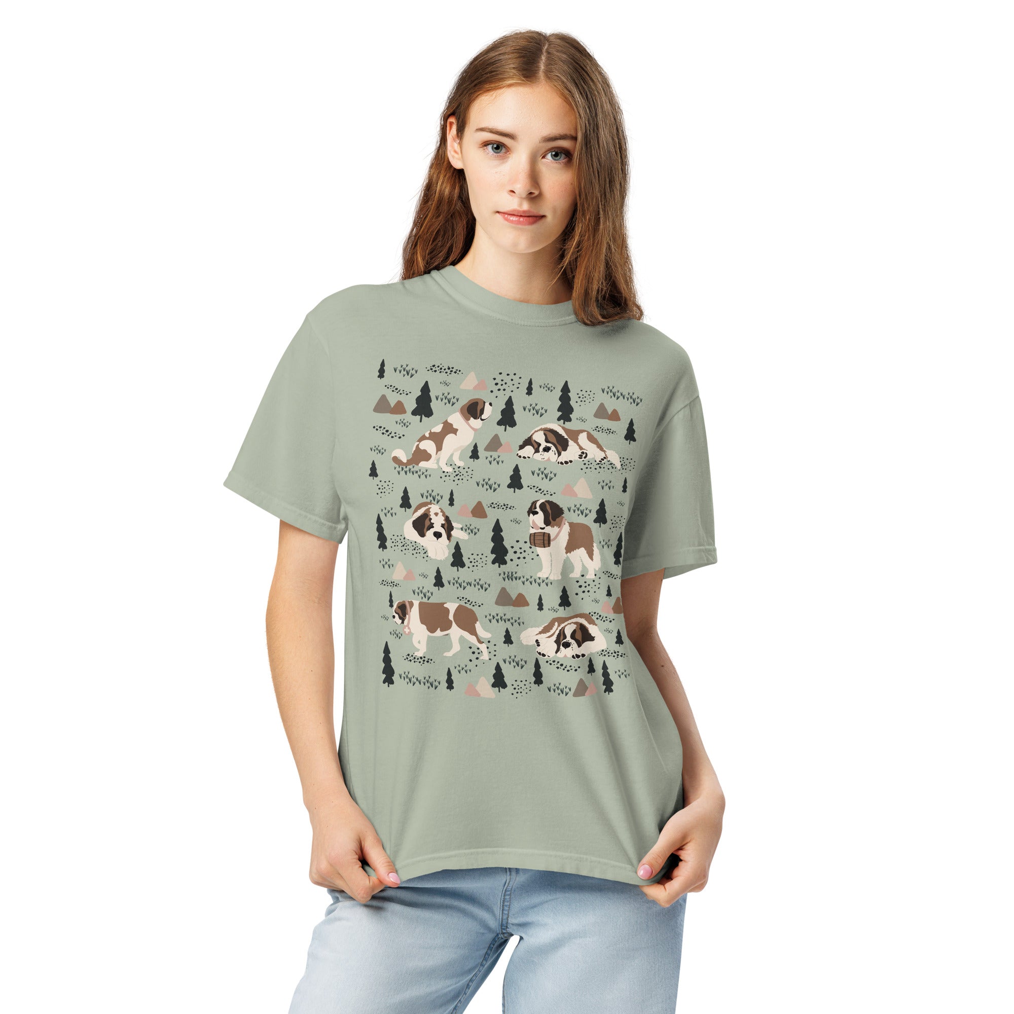 Comfort Colors bay green t-shirt featuring a woodland-themed Saint Bernard dog woodland and mountains pattern with six adorable Saint Bernards in various poses, perfect Saint Bernard gift for dog lovers.