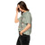 Comfort Colors bay green t-shirt featuring a woodland-themed Saint Bernard dog woodland and mountains pattern with six adorable Saint Bernards in various poses, perfect Saint Bernard gift for dog lovers.