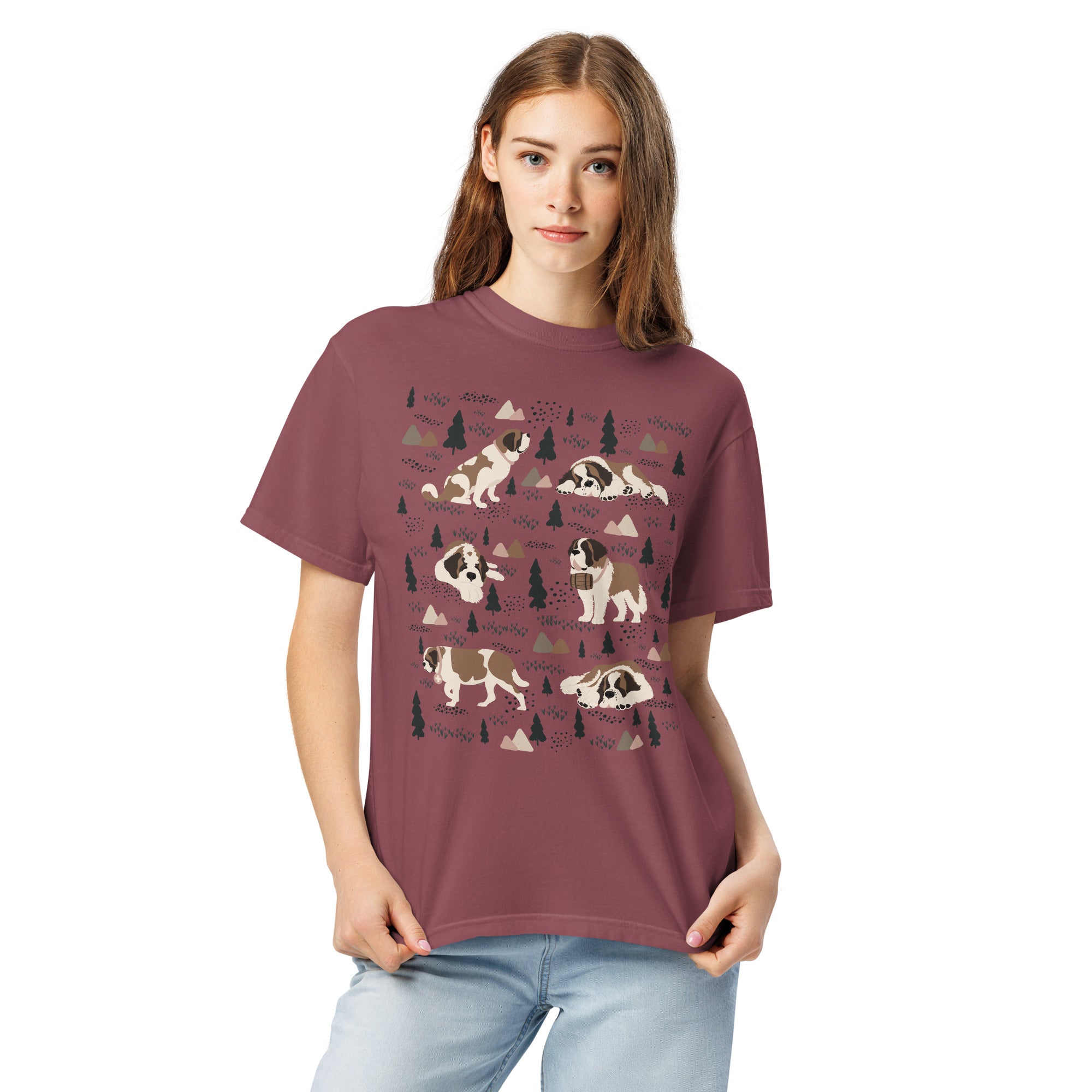 Comfort Colors Brick t-shirt featuring a woodland-themed Saint Bernard dog woodland and mountains pattern with six adorable Saint Bernards in various poses, perfect Saint Bernard gift for dog lovers.