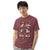 Comfort Colors Brick t-shirt featuring a woodland-themed Saint Bernard dog woodland and mountains pattern with six adorable Saint Bernards in various poses, perfect Saint Bernard gift for dog lovers.