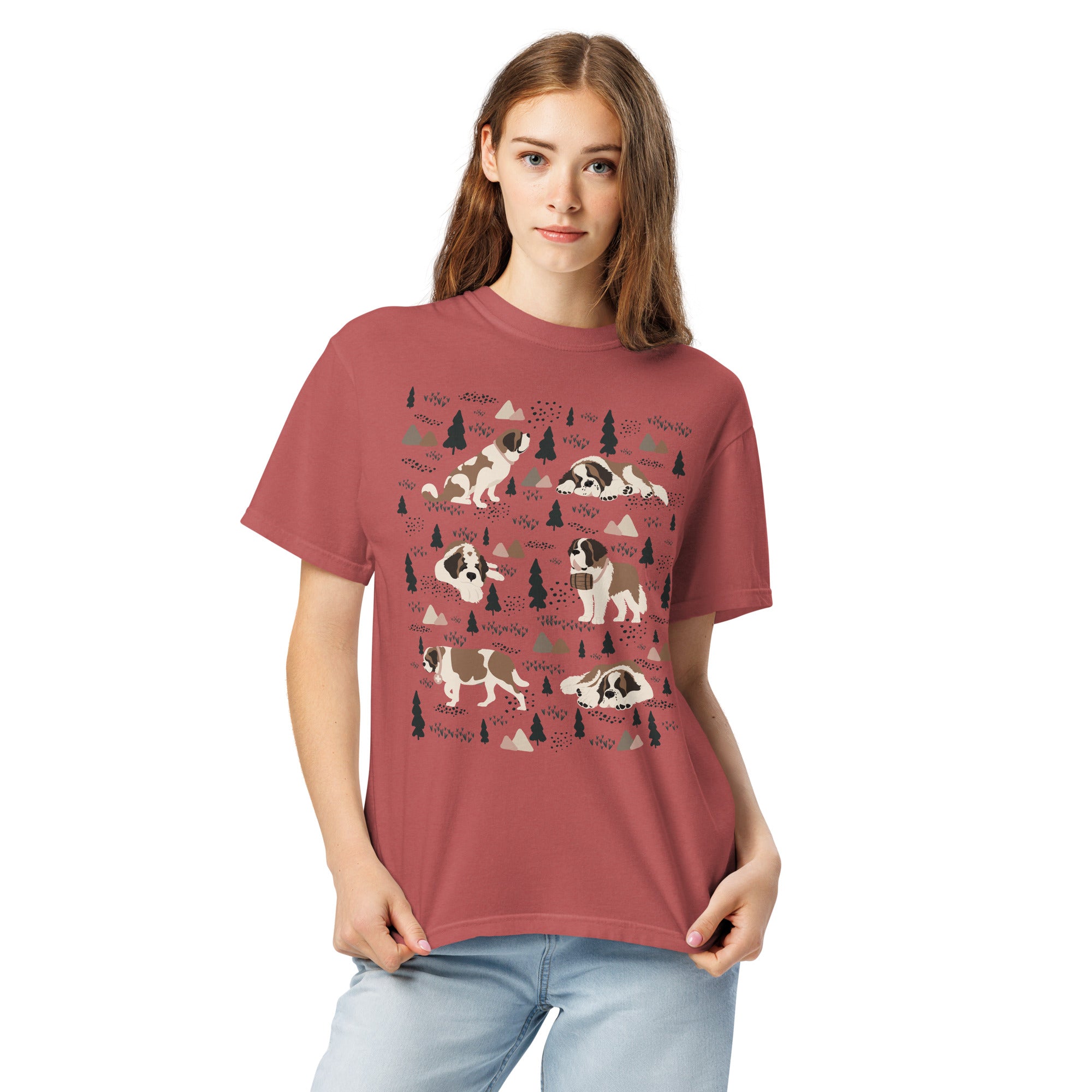 Comfort Colors Crimson t-shirt featuring a woodland-themed Saint Bernard dog woodland and mountains pattern with six adorable Saint Bernards in various poses, perfect Saint Bernard gift for dog lovers.