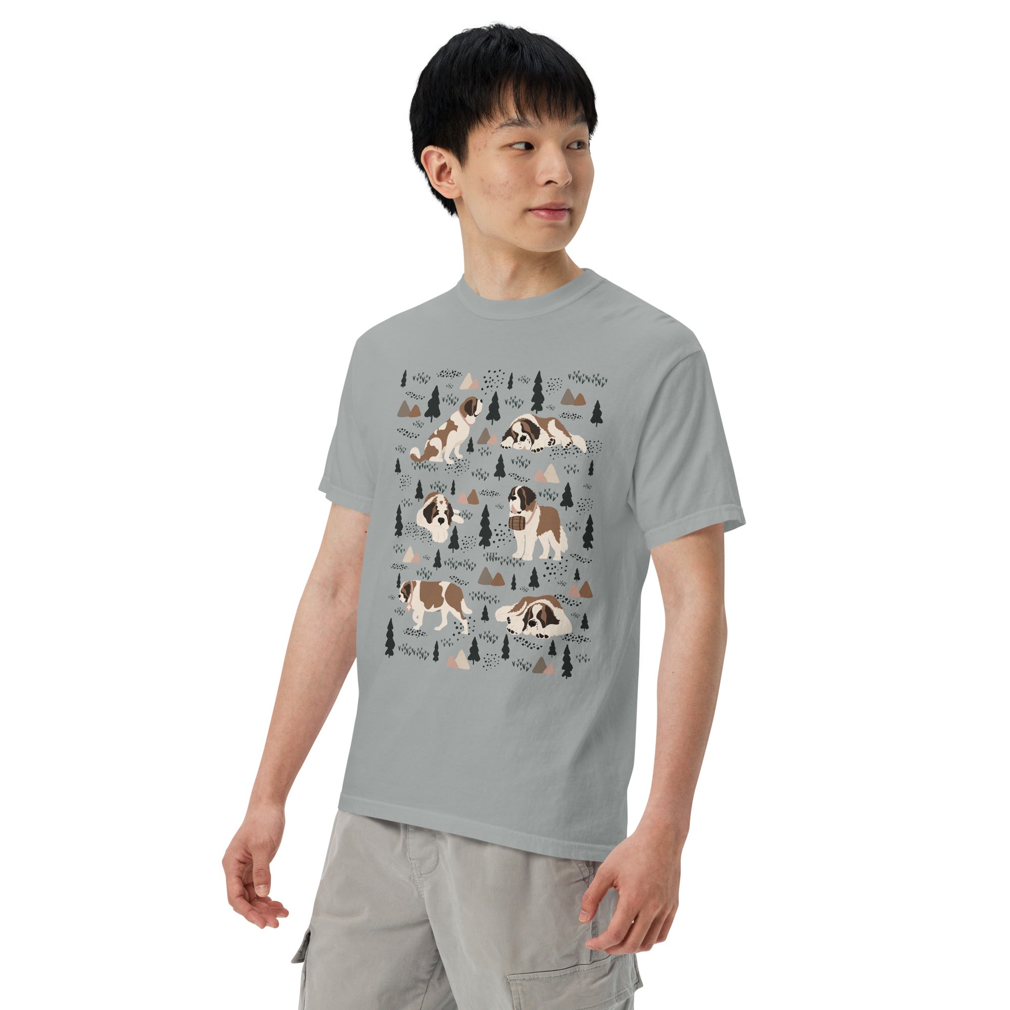 Comfort Colors Granite t-shirt featuring a woodland-themed Saint Bernard dog woodland and mountains pattern with six adorable Saint Bernards in various poses, perfect Saint Bernard gift for dog lovers.