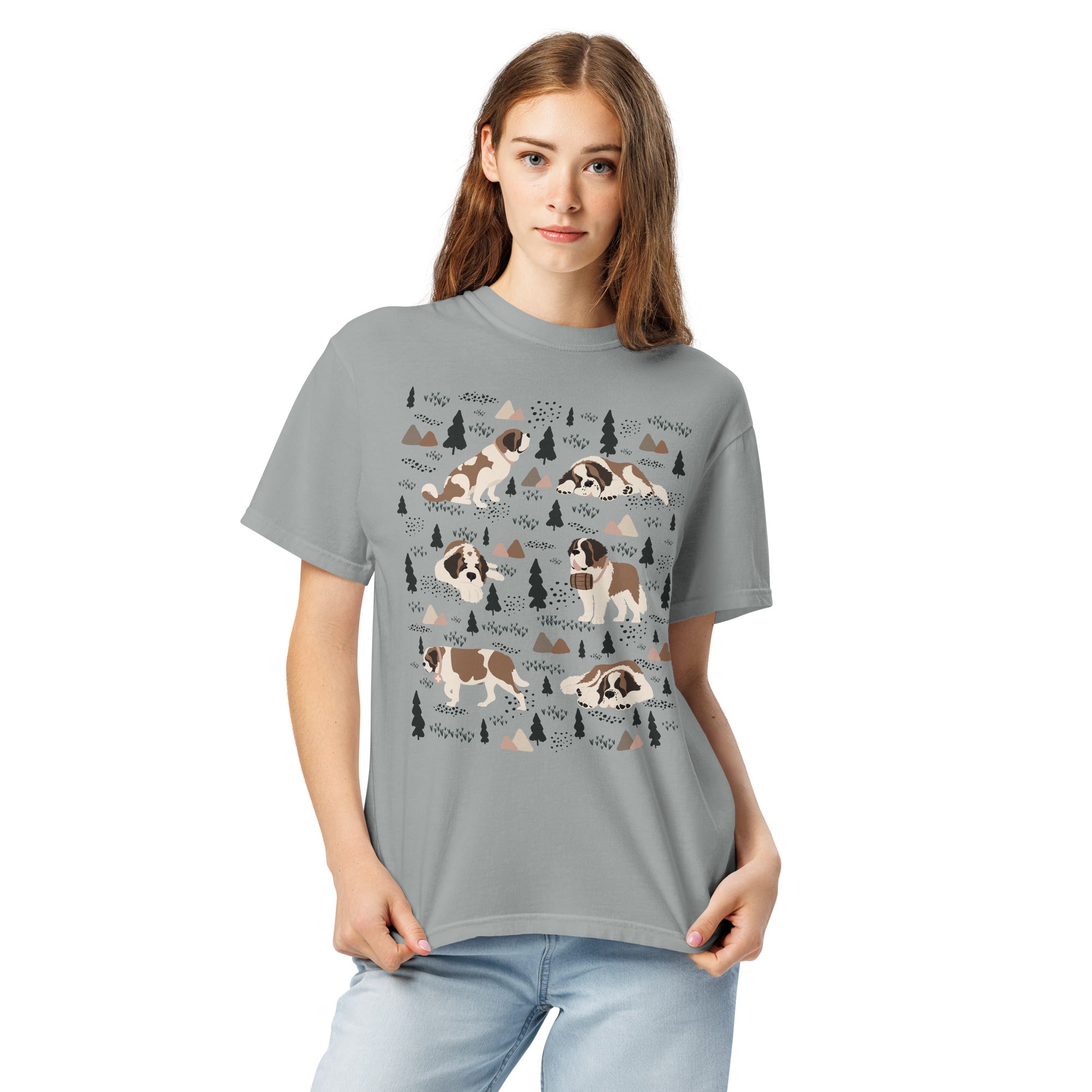 Comfort Colors Granite t-shirt featuring a woodland-themed Saint Bernard dog woodland and mountains pattern with six adorable Saint Bernards in various poses, perfect Saint Bernard gift for dog lovers.