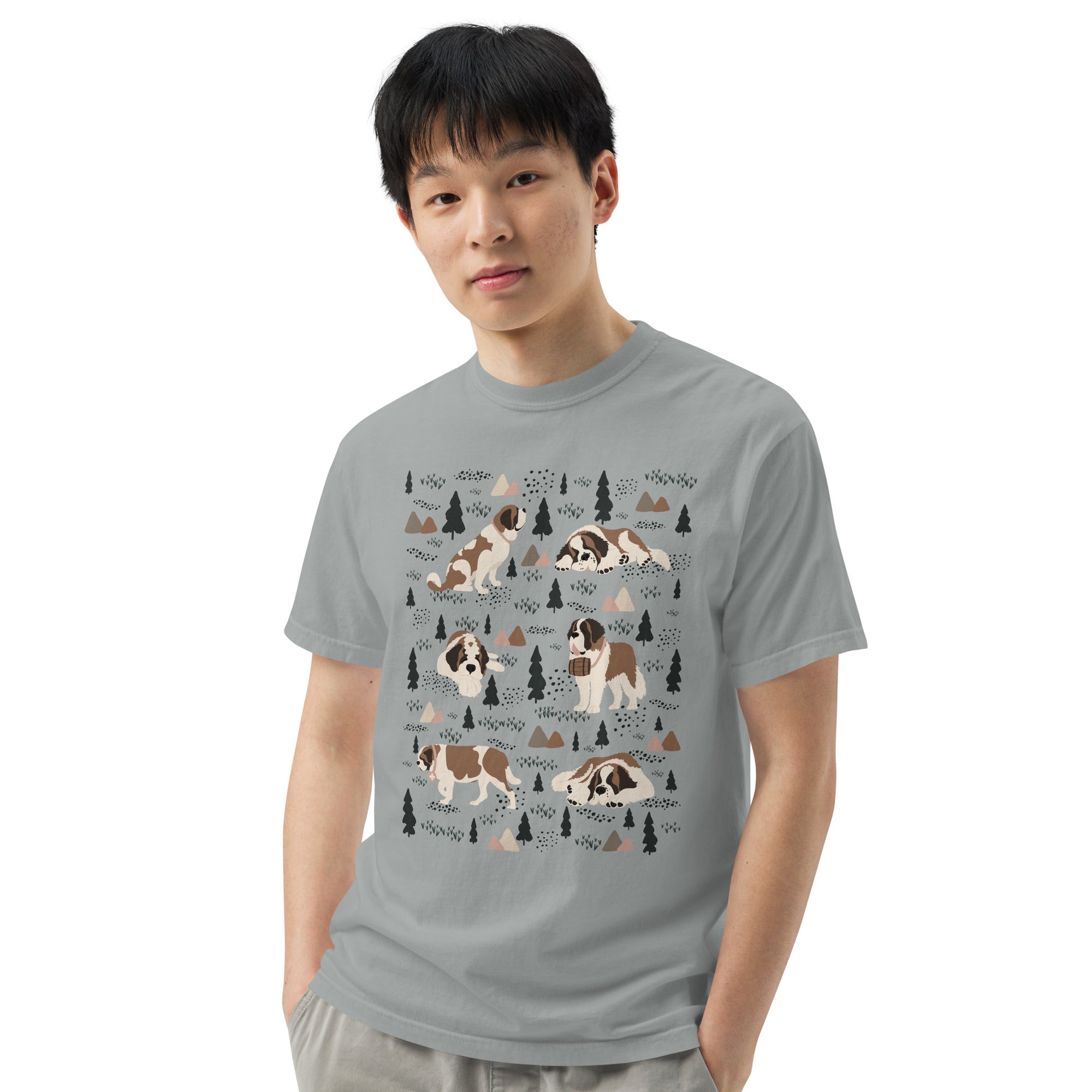 Comfort Colors Granite t-shirt featuring a woodland-themed Saint Bernard dog woodland and mountains pattern with six adorable Saint Bernards in various poses, perfect Saint Bernard gift for dog lovers.