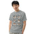 Comfort Colors Granite t-shirt featuring a woodland-themed Saint Bernard dog woodland and mountains pattern with six adorable Saint Bernards in various poses, perfect Saint Bernard gift for dog lovers.