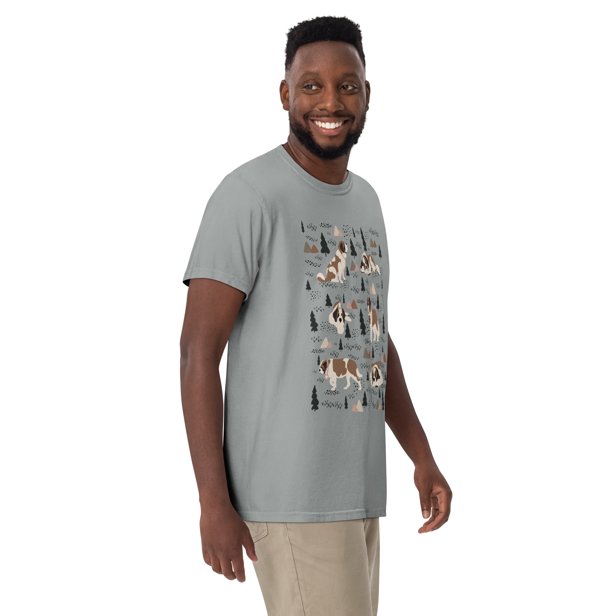 Comfort Colors Granite t-shirt featuring a woodland-themed Saint Bernard dog woodland and mountains pattern with six adorable Saint Bernards in various poses, perfect Saint Bernard gift for dog lovers.