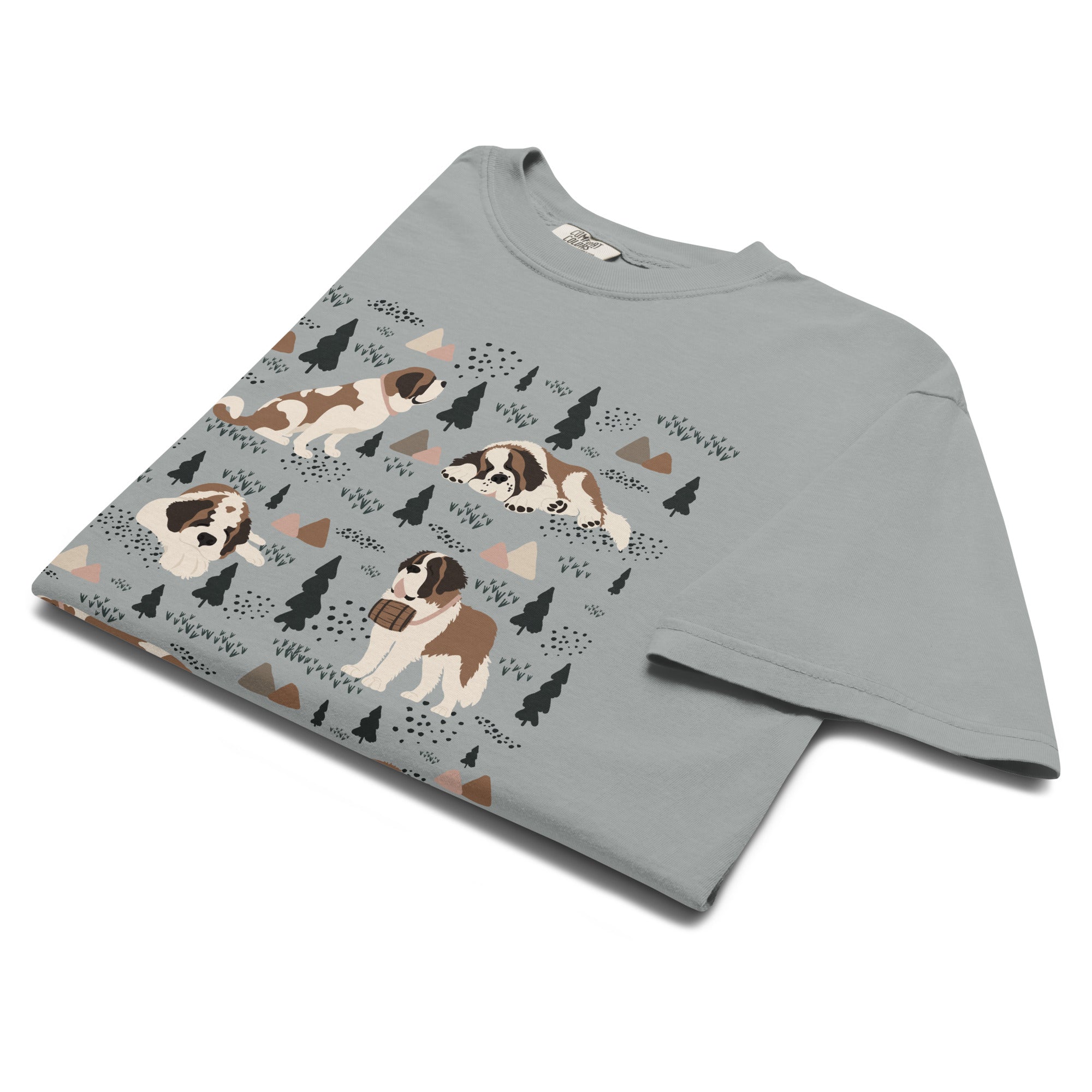 Comfort Colors Granite t-shirt featuring a woodland-themed Saint Bernard dog woodland and mountains pattern with six adorable Saint Bernards in various poses, perfect Saint Bernard gift for dog lovers.