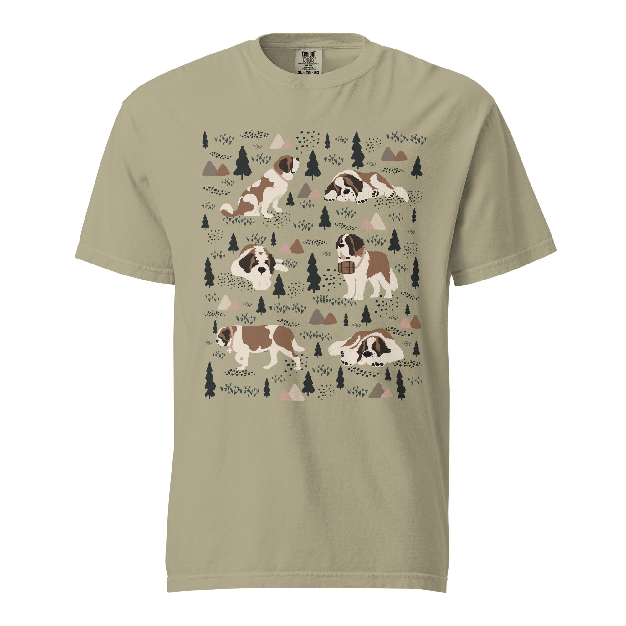 Comfort Colors Khaki t-shirt featuring a woodland-themed Saint Bernard dog woodland and mountains pattern with six adorable Saint Bernards in various poses, perfect Saint Bernard gift for dog lovers.