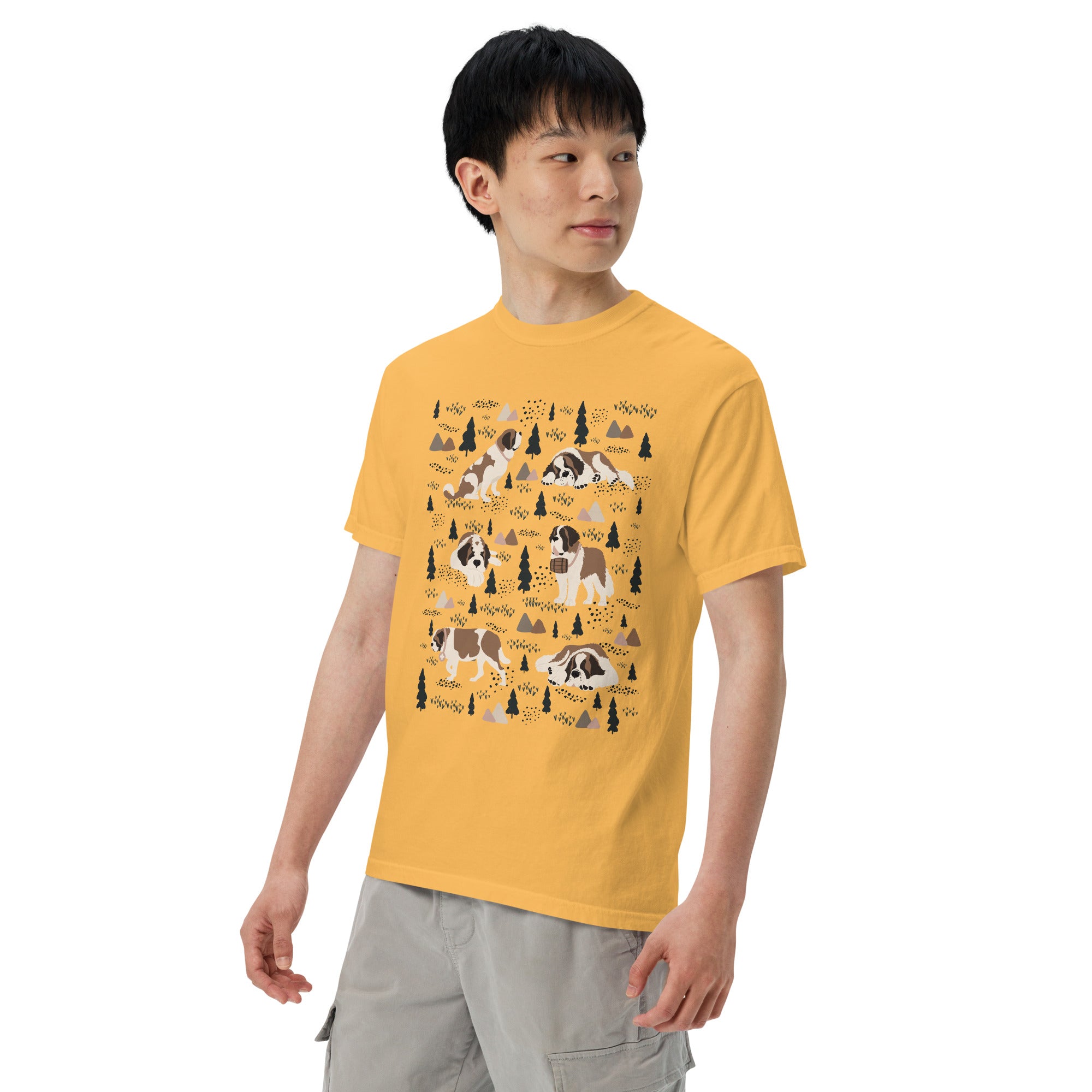 Comfort Colors Mustard t-shirt featuring a woodland-themed Saint Bernard dog woodland and mountains pattern with six adorable Saint Bernards in various poses, perfect Saint Bernard gift for dog lovers.