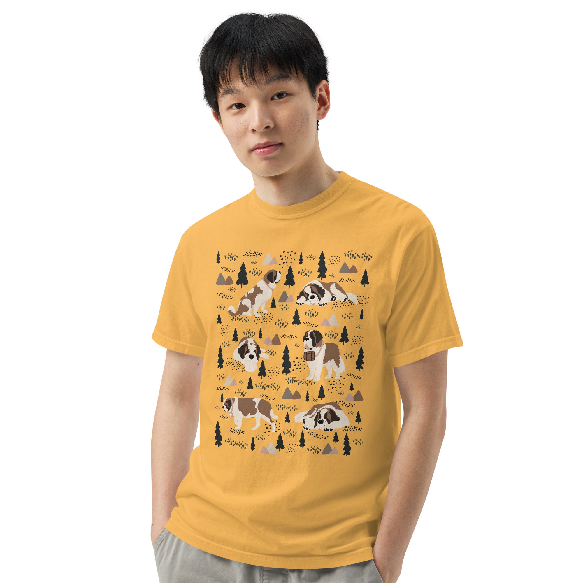 Comfort Colors Mustard t-shirt featuring a woodland-themed Saint Bernard dog woodland and mountains pattern with six adorable Saint Bernards in various poses, perfect Saint Bernard gift for dog lovers.