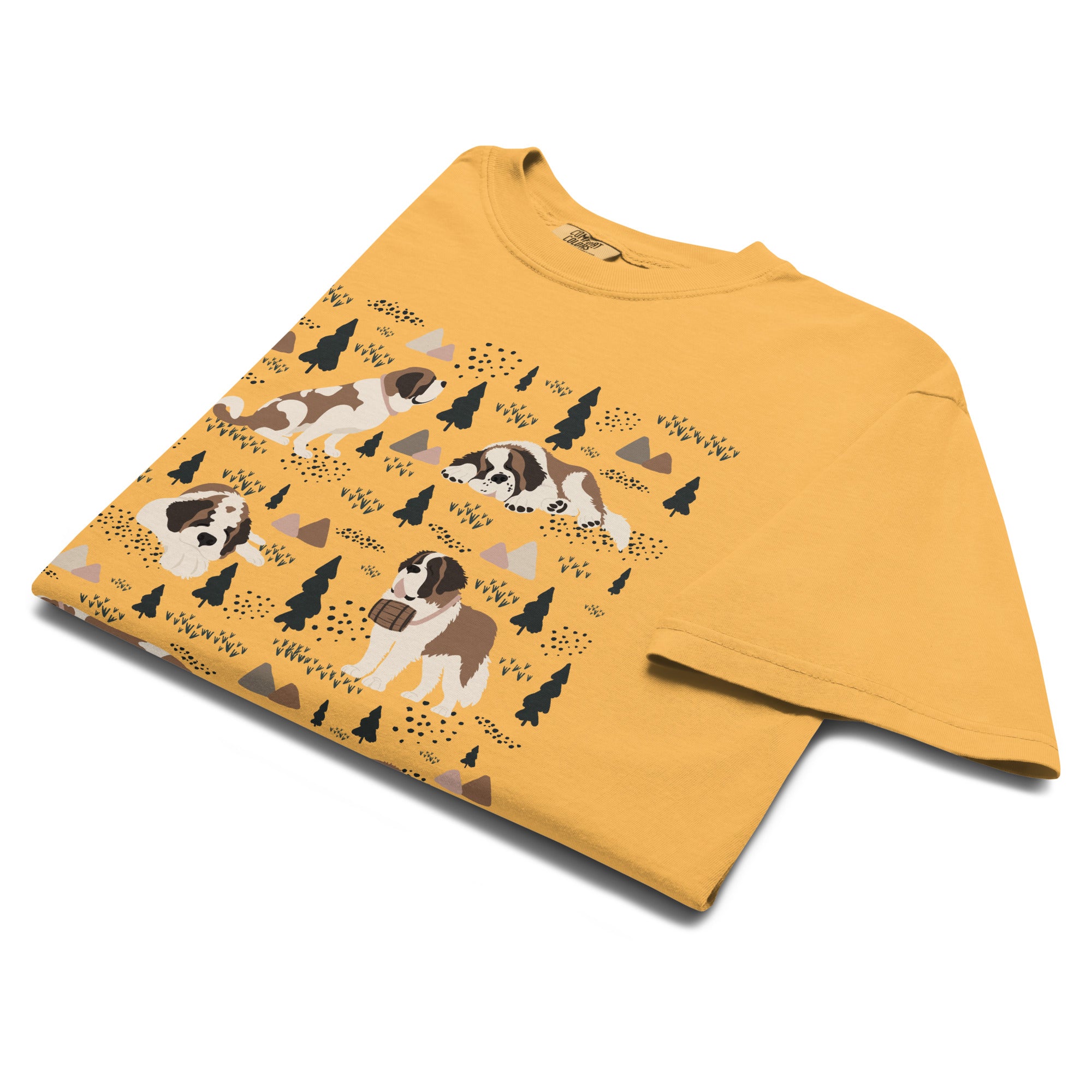 Comfort Colors Mustard t-shirt featuring a woodland-themed Saint Bernard dog woodland and mountains pattern with six adorable Saint Bernards in various poses, perfect Saint Bernard gift for dog lovers.
