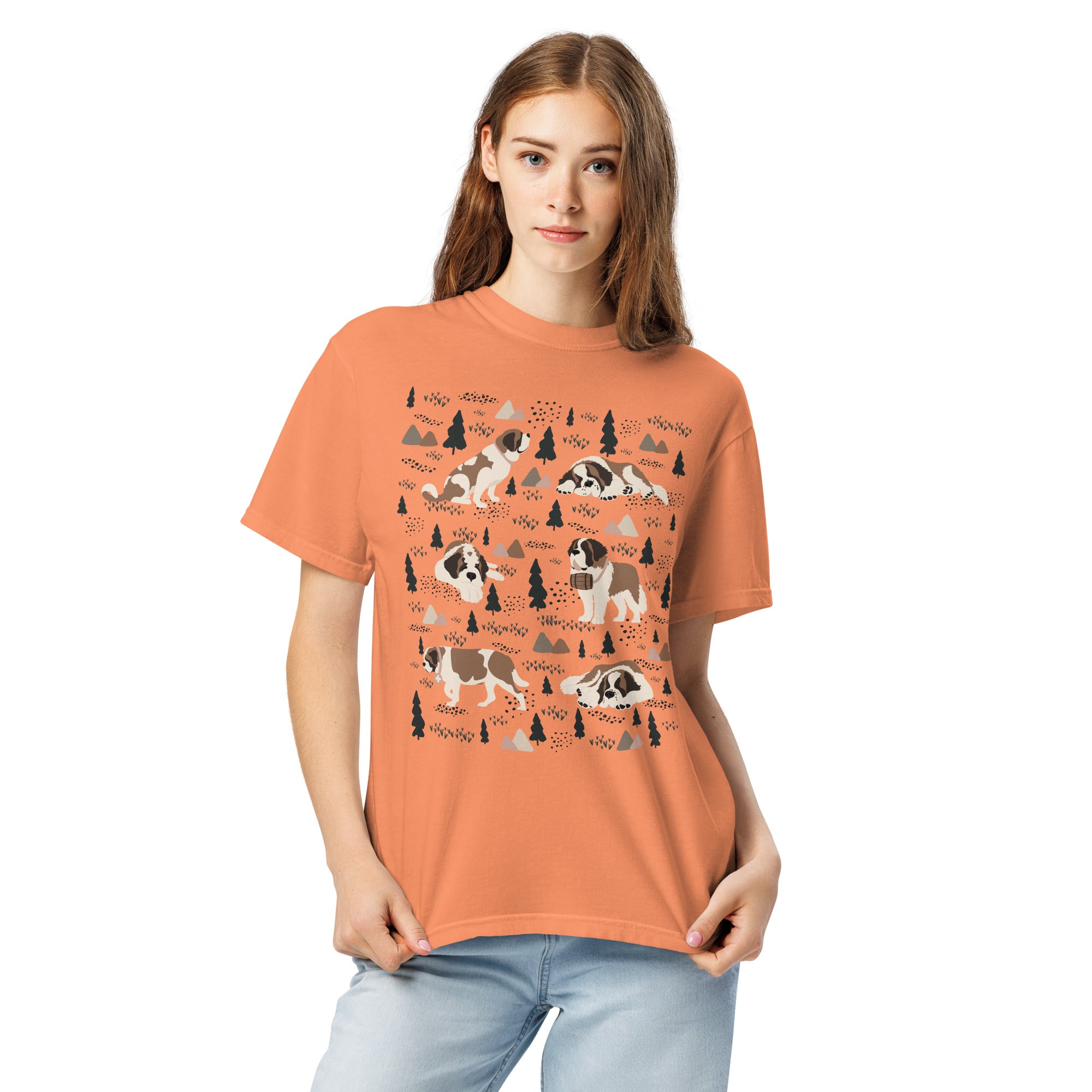 Comfort Colors Terracotta t-shirt featuring a woodland-themed Saint Bernard dog woodland and mountains pattern with six adorable Saint Bernards in various poses, perfect Saint Bernard gift for dog lovers.